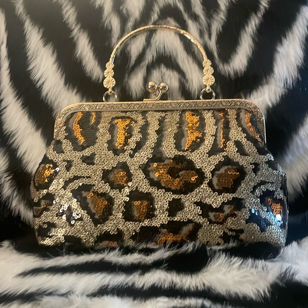 Gold/copper/black leopard sequined clutch or handbag with gold and pearl handles